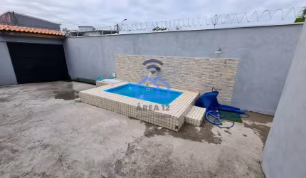 Ótima casa com piscina à venda no bairro Perequê Mirim em Caraguatatuba, SP - Se encante com esse b