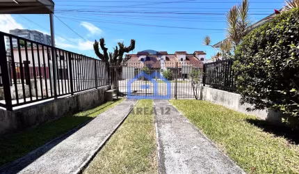 Casa em condomínio à Venda no bairro do Indaiá em Caraguatatuba, SP - Ótima oportunidade de investi