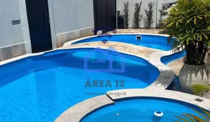 Sobrado triplex frente-mar à venda no bairro do Indaiá em Caraguatatuba, SP - Com piscina, área gou
