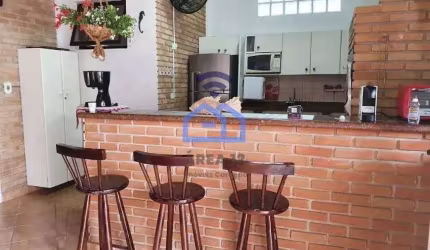 Sobrado com piscina e área gourmet à venda no bairro da Praia das Palmeiras em Caraguatatuba, SP