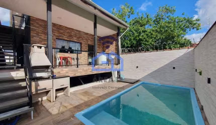 Sobrado à venda no bairro do Aruan em Caraguatatuba, SP - Com 7 dormitórios e piscina!