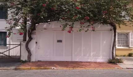 Casa comercial com vaga.