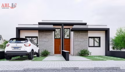 Casa 2 dormitórios com suíte e  pátio