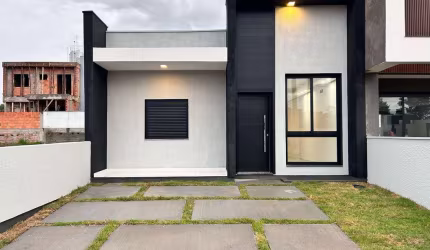 Casa à venda  com 03 dormitórios um suite no Reserva Bela Vista bairro Loteamento Jardim Timbaúva - Gravataí/RS
