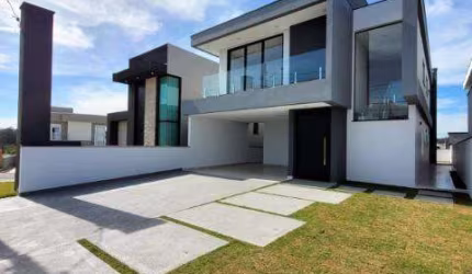 VENDA DE CASA NO CONDOMÍNIO REAL PARK, EM ARUJÁ/SP, 300m² com 4 suítes, 3 salas, área gourmet, piscina e garagem para 4 autos. CONSULTE-NOS.
