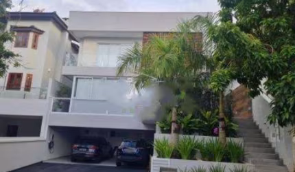 VENDA DE CASA NO CONDOMÍNIO ARUJÁ V EM ARUJÁ/SP, 300m² 4 suítes, piscina, área gourmet. CONSULTE-NOS