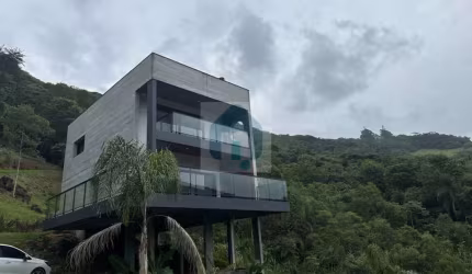 Casa em Condomínio Fechado em Garopaba na Praia do Siriú/SC - Condomínio Canto do Poeta - CA1218
