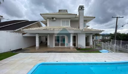 Casa duplex de esquina com 4 dormitórios - Pedra Branca/ Palhoça - CA063-500
