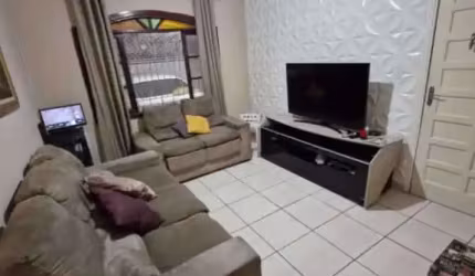 Casa com 2 dormitórios à venda, 135 m² por R$ 480.000,00 - Tupi - Praia Grande/SP
