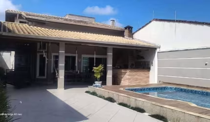 Casa com 3 dormitórios à venda, 190 m² por R$ 890.000 - Jardim Regina - Itanhaém/SP