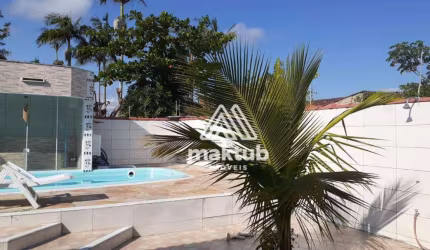 Casa com 3 dormitórios à venda, 120 m² por R$ 490.000,00 - Estância Balneária Maria Helena Novaes - Peruíbe/SP