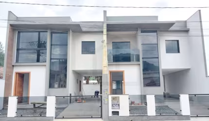 CASA GEMINADA DE 113,31m² COM TRÊS DORMITÓRIOS SENDO UMA SUÍTE