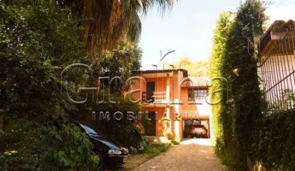 Casa com 5 quartos à venda na Rua Chile, 853, Jardim Botânico, Porto Alegre por R$ 1.200.000