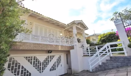 Casa com 5 quartos à venda na Indianópolis, 240, Três Figueiras, Porto Alegre por R$ 2.000.000