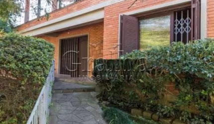 Casa com 4 quartos à venda na Rua Fonseca Guimarães, 34, Medianeira, Porto Alegre por R$ 1.500.000