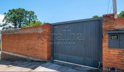 Casa com 3 quartos à venda na Rua Oswaldo Olmiro Machado, 8, Ipanema, Porto Alegre por R$ 325.000