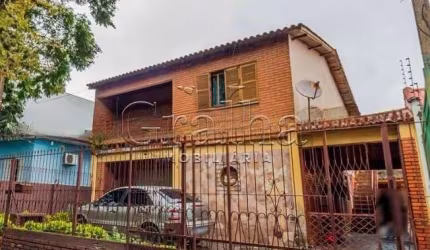 Casa com 6 quartos à venda na Rua Valparaíso, 945, Jardim Botânico, Porto Alegre por R$ 750.000