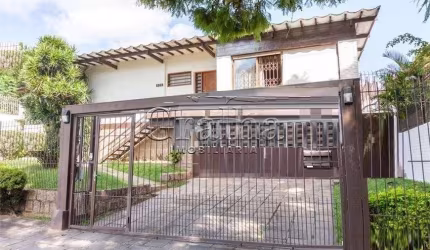 Casa com 4 quartos à venda na Rua João Paetzel, 821, Chácara das Pedras, Porto Alegre por R$ 1.490.000