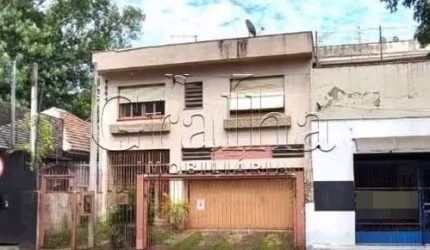 Casa com 5 quartos à venda na Rua Santa Cecília, 1738, Santa Cecília, Porto Alegre por R$ 900.000