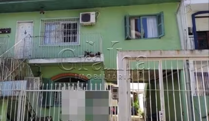 Casa com 4 quartos à venda na Avenida Montenegro, 215, Petrópolis, Porto Alegre por R$ 1.011.000