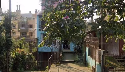 Casa com 4 quartos à venda na Rua Eudoro Berlink, 946, Auxiliadora, Porto Alegre por R$ 1.200.000