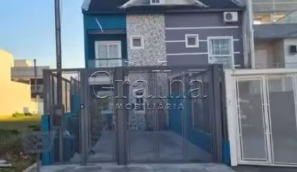 Casa em condomínio fechado com 4 quartos à venda na Rua Silvino Nedel, 100, Mário Quintana, Porto Alegre por R$ 640.000