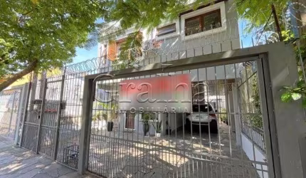 Casa com 4 quartos à venda na Rua Coronel Jaime da Costa Pereira, 376, Partenon, Porto Alegre por R$ 980.000