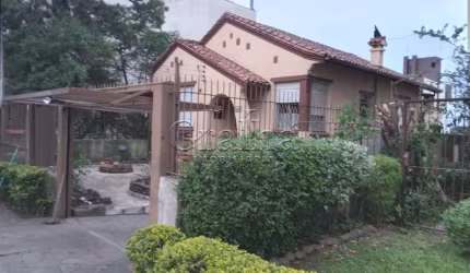 Casa com 3 quartos à venda na Rua Luzitana, 658, Higienópolis, Porto Alegre por R$ 1.000.000
