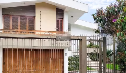 Casa com 3 quartos à venda na Travessa Bermudas, 67, Jardim Lindóia, Porto Alegre por R$ 1.380.000