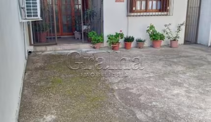 Casa com 3 quartos à venda na Rua Honório Lemos, 354, Partenon, Porto Alegre por R$ 390.000