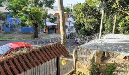 Casa com 4 quartos à venda na Rua Pedro Velho, 264, Partenon, Porto Alegre por R$ 400.000