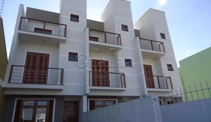 Casa com 2 quartos à venda na Rua Hugo Nelson Magalhães, 139, Parque Santa Fé, Porto Alegre por R$ 499.000