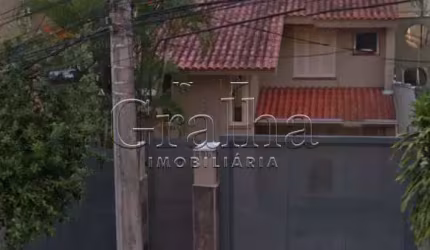 Casa com 4 quartos à venda na Rua Miguel Couto, 890, Menino Deus, Porto Alegre por R$ 1.100.000