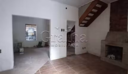 Casa com 4 quartos à venda na Rua Santo Antônio, 82, Floresta, Porto Alegre por R$ 490.000