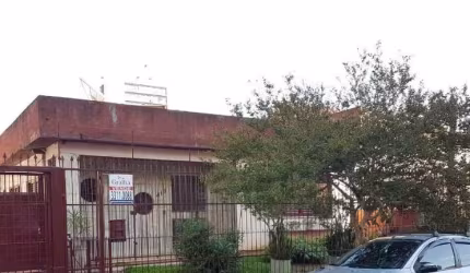 Casa com 5 quartos à venda na Rua Afonso Rodrigues, 413, Jardim Botânico, Porto Alegre por R$ 1.450.000