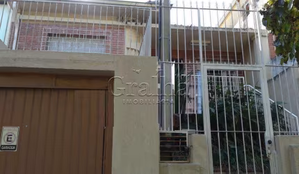 Casa com 3 quartos à venda na Praça Jayme Telles, 50, Santana, Porto Alegre por R$ 790.000