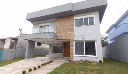 Casa em condomínio fechado com 4 quartos à venda na Estrada das Três Meninas, 1501, Campo Novo, Porto Alegre por R$ 2.150.000