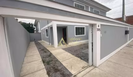 Casa com 3 dormitórios à venda, 144 m² por R$ 550.000 - Jardim Mariléa - Rio das Ostras/RJ