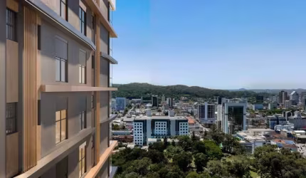 Apartamento de alto padrão no bairro América, Joinville-SC: 4 quartos, 4 suítes, 3 salas, 5 banheiros, 3 vagas de garagem.