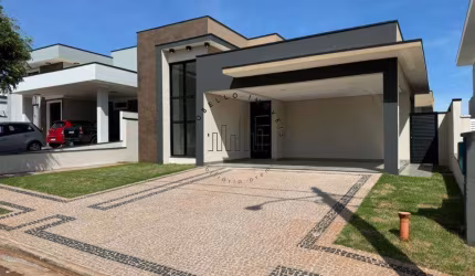 Casa à venda em Paulínia, Loteamento Terras do Cancioneiro, com 3 suítes, com 205 m²