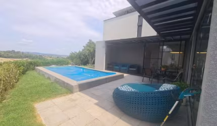 Casa nova dentro de condomínio fechado em área nobre de Atibaia SP com 4 suítes,  piscina, área gourmet.