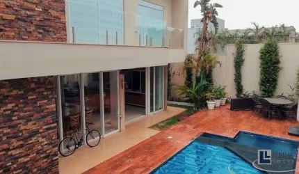 Maravilhoso sobrado altíssimo padrão para venda no charmoso Alphaville 2 em Bonfim Paulista, 5 suites, gourmet e piscina em 414 m2 construidos