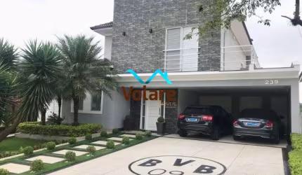Casa de alto padrão em condomínio Alphaville, Santana de Parnaíba-SP! 4 suítes, 4 vagas de garagem, 325m² de área. Venha conferir!