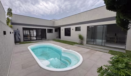 Casa nova com piscina em Atlântida Sul, próxima da praia