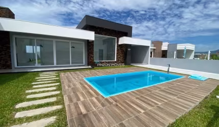 Casa Com piscina próximo ao centro em Arroio do Sal