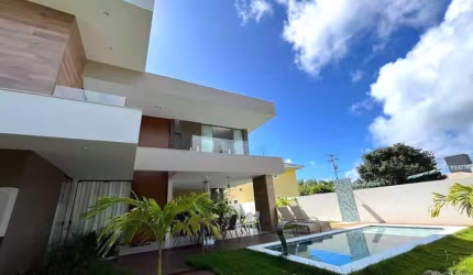 Luxuosa casa em condomínio à venda em Guarajuba, Camaçari-BA: 5 quartos, 5 suítes, 1 sala, 6 banheiros, 4 vagas de garagem, 250m².