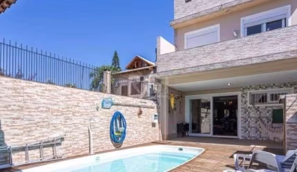 Excelente casa com 3 dormitórios e piscina