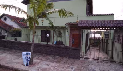 Prédio residencial de 338m² com 4 apartamentos independentes no bairro Santa Tereza