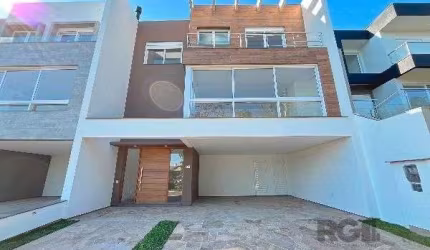 Casa Condominio em Porto Alegre, no bairro Hípica, com 3 dormitório(s), e 3 banheiros, à venda.