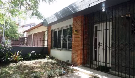 Casa no bairro Jardim Botânico de 3 dormitórios e 2 vagas